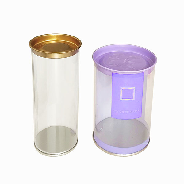 Clear plastic cylinder tube box with colored tinplate lid